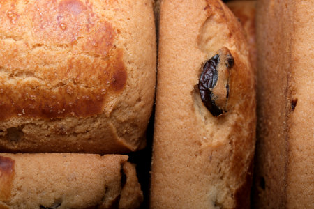 Wholesome loaves of bread cooling in a warm kitchen atmosphere.の写真素材