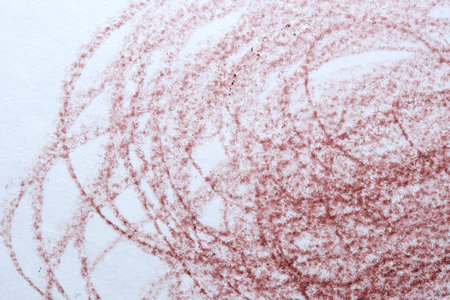 Soft red lines curve and overlap, creating a vibrant abstract expression.の写真素材