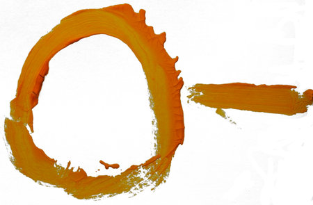 A bold, sunlit brushstroke flows with bright orange hues across the canvas.の写真素材