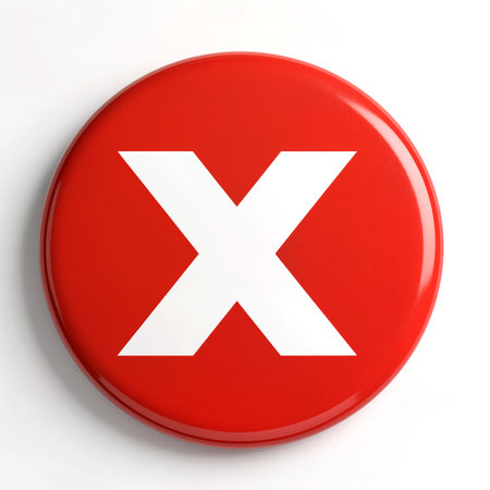 Bright red button featuring a striking white X, perfect for signaling or alerts.の素材