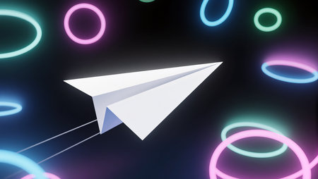 A sleek paper airplane glides through vibrant neon circles, evoking a sense of freedom.の素材