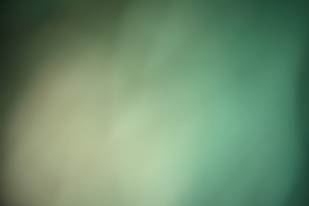 Gentle hues of green and beige mix softly, creating a calming atmosphere.