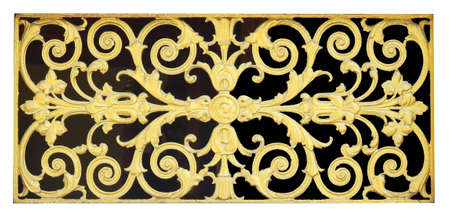 Wooden thai style craving on wall or windows in temple of northern Thailand isolated on black background.の写真素材