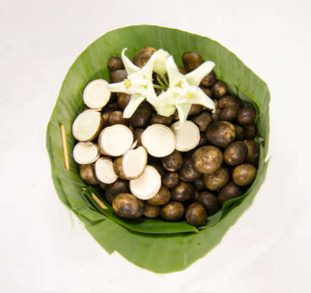 Thai puff ball mushrooms in count of banana leaf.の写真素材