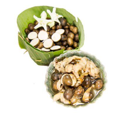 Thai puff ball Earthstars and Oyster mushroom sour soup.の写真素材