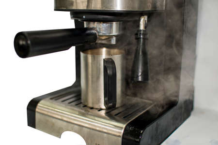 Automatic coffeeÂ  maker machine with hot steam.の写真素材