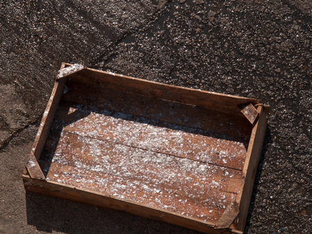 Fish crate with some sardine flakesの写真素材