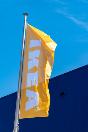 Coruna, Spain; april 01 2019: IKEA flag waving on flagpole on sunny dayのeditorial素材