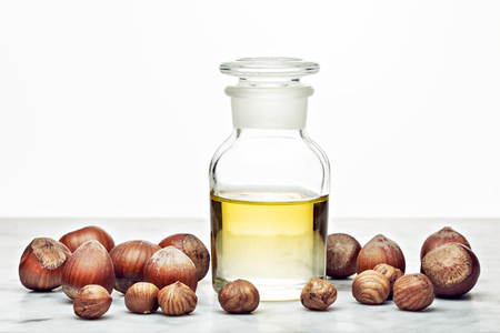 Hazelnut oil isolated on white background for Cosmetic or beauty careの写真素材