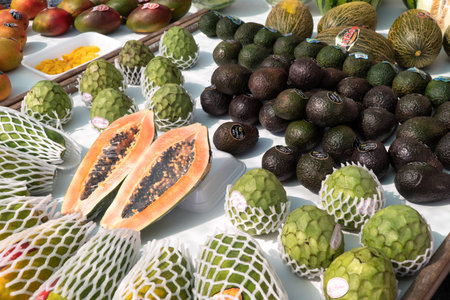 Padron, Spain; May 05, 2019: Fresh tropical fruits for sale at farmers market
