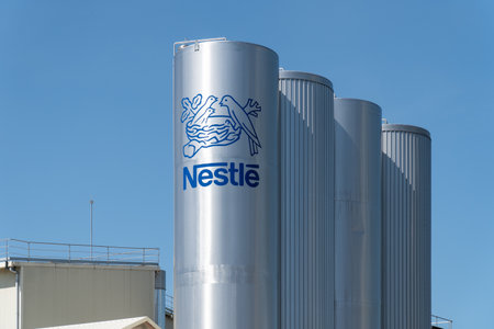 Pontecesures, Spain; june 16, 2019: Nestle logo on tank of Pontecesures factoryのeditorial素材