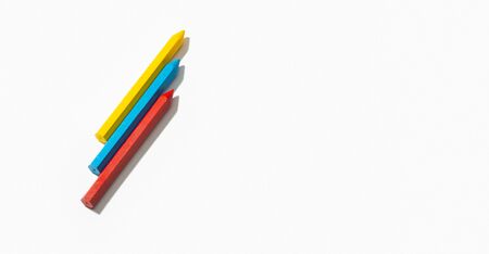 Colored crayons isolated on white background. Copy space for text. Back to school conceptの写真素材
