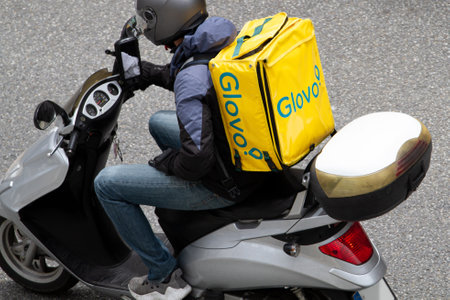 Galicia, Spain; May 22, 2020: Glovo food delivery courierのeditorial素材