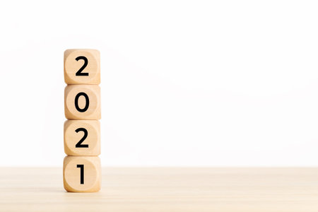 2021 year concept. Wooden Blocks With text on table. Copy space