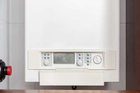 Gas water heater controlling panel or Gas boiler in a home indoorの写真素材
