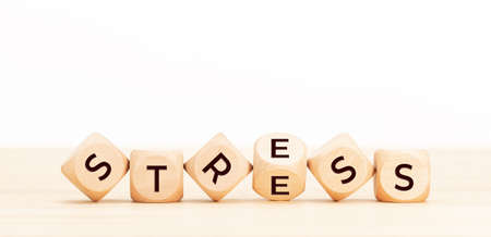 Stress concept. Wooden blocks with word on table. Copy spaceの写真素材