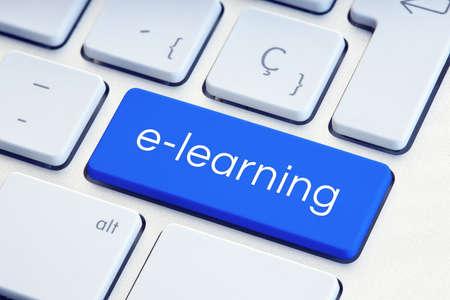 E-learning or online education concept. Text on computer Keyboard Keyの写真素材