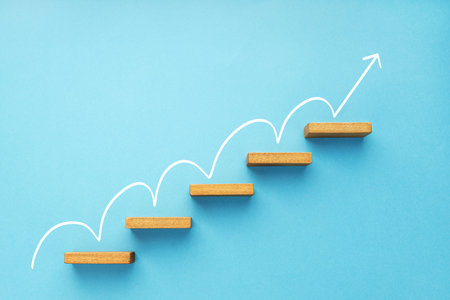 Rising arrow on staircase on blue background. Growth, increasing business, success process concept....
