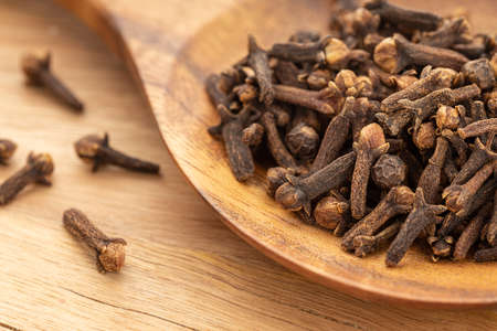 Spice cloves on wooden spoon. Cooking Spices. Syzygium aromaticumの写真素材