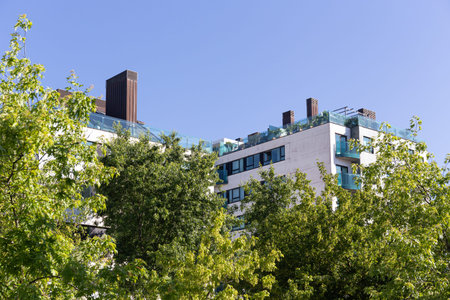 Modern apartment building with beautiful roof terrace. Copy spaceの写真素材