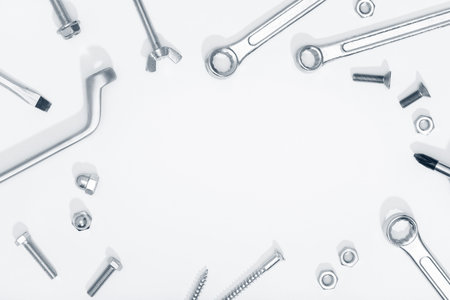 Border frame of Tool, screw and nut on white background. Copy space. Labor day concept