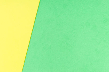 Yellow and green foam sheet with diagonal texture background. Full frameの写真素材