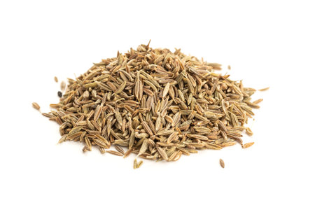 Pile of Cumin seeds isolated on white background. Cuminum cyminumの写真素材