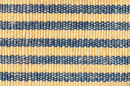 Yellow and blue fabric background texture. Full frame