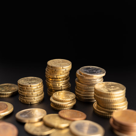 Background of Euro coins on black background. Currency Money. Copy spaceの写真素材