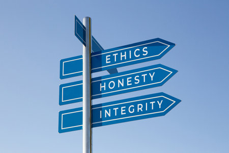 Ethics honesty integrity words on signpost isolated on sky backgroundの写真素材