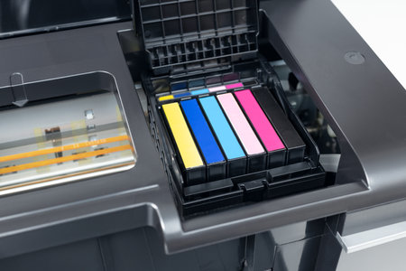 Close up of a multicolor ink cartridges of a inkjet printer. Cartridges change conceptの写真素材