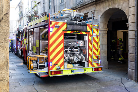 Santiago de Compostela, Spain; september 10, 2022: Fire truck and firefighters working on the street...