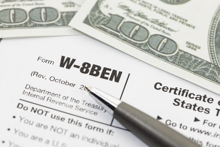Close up of a W 8BEN form. Business Form W-8BEN Certificate of Foreign Status of Beneficial Owner...