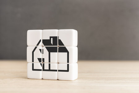Cube blocks with house icon. Real estate concept. Copy spaceの写真素材