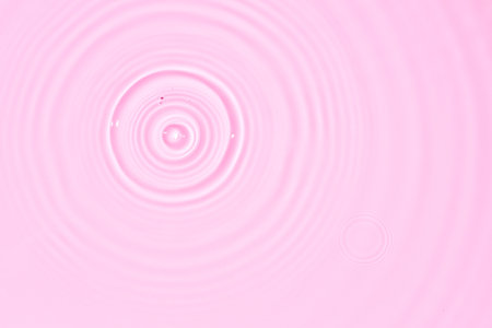 Water surface abstract background texture with splashes and bubbles. Pink colorの写真素材