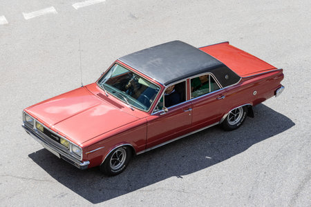Galicia, Spain; august 27, 2023: High angle view of a Dodge GT 3700 classic car driving on a road