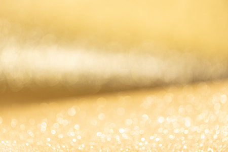 Blurry Golden Glitter Abstract Background. Full frameの写真素材