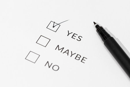 Yes maybe or No Check boxes on white paperの写真素材