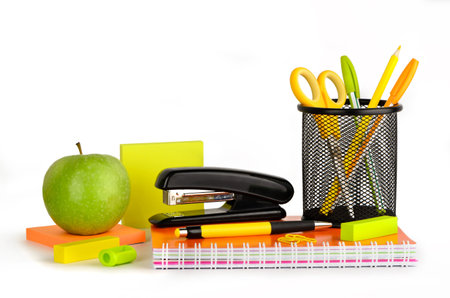 Stationery in green and yellow colors on a white background