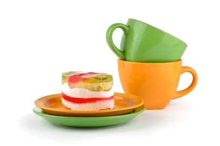Exotic cakes with citrus on the colored plates