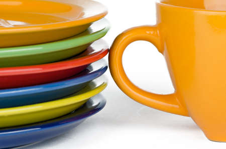 Color plates of each other in the stack with a cupの写真素材