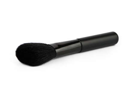 Cosmetic powder brush on a white backgroundの写真素材