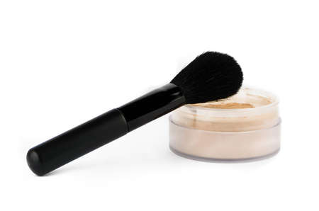 Cosmetic brush and powder on white backgroundの写真素材