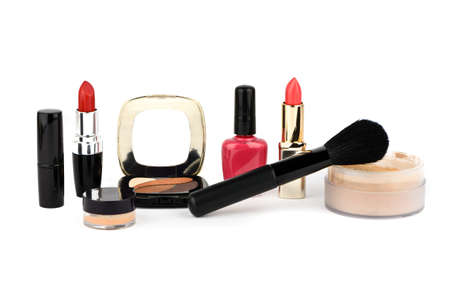 Cosmetic set on a white background with a black brushの写真素材