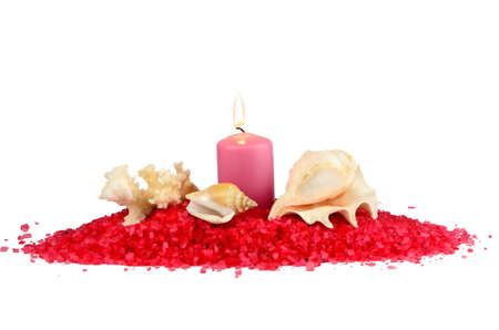 Sea salt, candles and seashells on white backgroundの写真素材