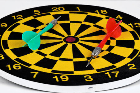 Darts and arrows on a white closeup