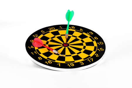 Darts and arrows on a white closeupの写真素材