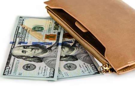 Two hundred new dollars and a purse on a white backgroundの写真素材