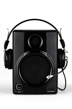 A set of speakers, a microphone and headphones on a white backgroundの写真素材