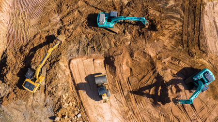 Aerial view excavator working on a construction site.